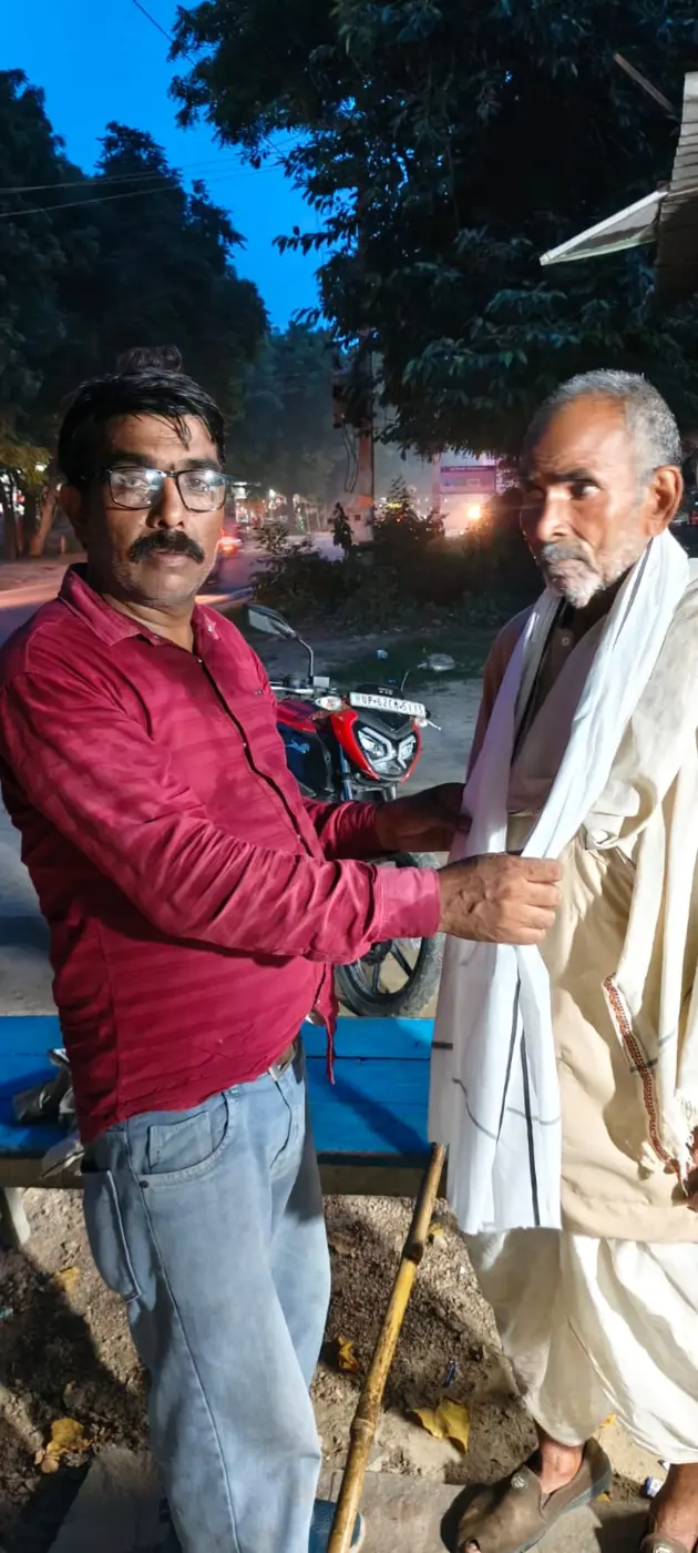 Volunteer meeting an elderly community member